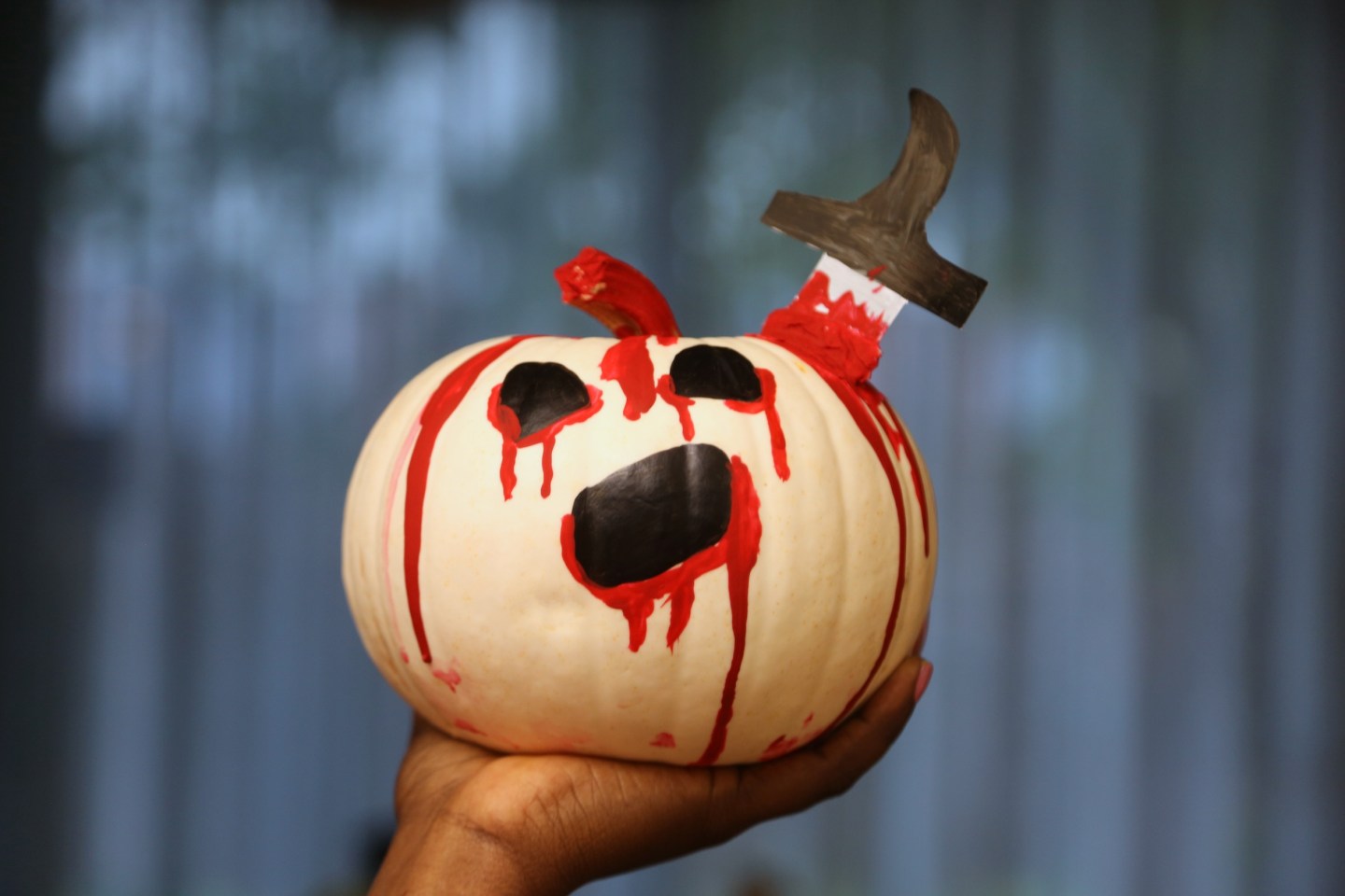 Woman holds a decorated pumpkin the day before Halloween in Toronto Ontario, Canada. on October 30, 2021. (Photo by Creative Touch Imaging Ltd./NurPhoto)