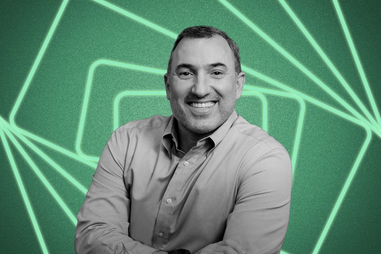 Chegg COO Nathan Schultz over a green background with a pattern of bright green rectangles.