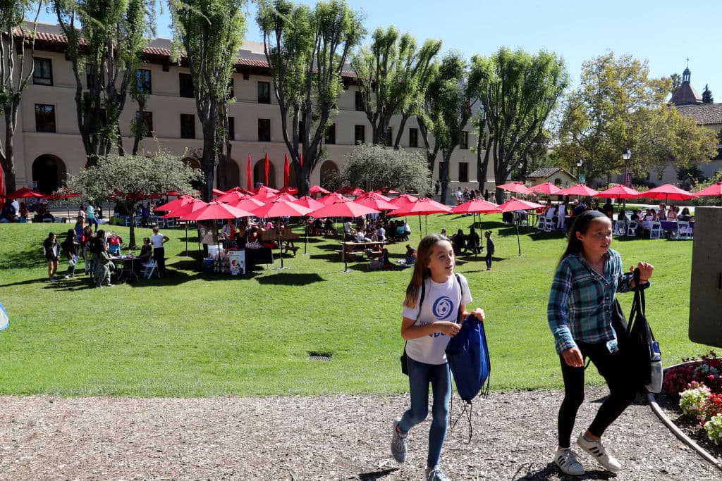 Girls walk around during the World Wide Women Girls' Festival at Santa Clara University in Santa Clara, California, as seen in October 2018. (Ray Chavez—Digital First Media/The Mercury News/Getty Images)