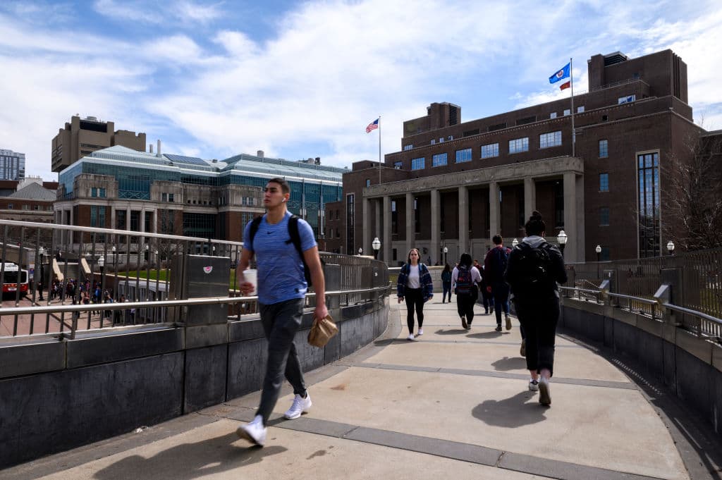 A pedestrian passes by on the University of Minnesota campus, as seen in April 2019 in Minneapolis, Minnesota. (Photo by Stephen Maturen/Getty Images)
