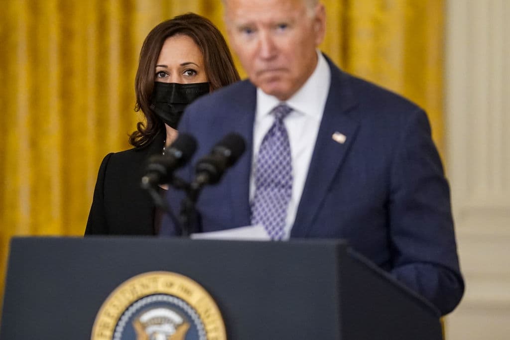 Vice President Kamala Harris looks on as President Joe Biden takes a question from a reporter, as seen in August 2021. (Kent Nishimura—Los Angeles Times/Getty Images)