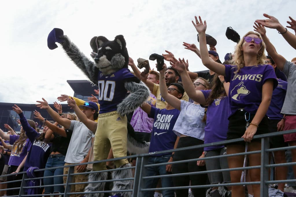 Washington Huskies mascot Harry the Husky stands with the student section before a college football game between the Montana Grizzlies and the Washington Huskies, as seen in September 2021, at Husky Stadium in Seattle. (Photo by Jacob Snow—Icon Sportswire/Getty Images)