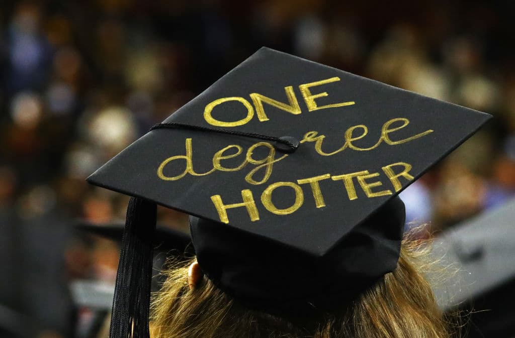 A graduates decorated cap during the Boston College COVID-19-delayed commencement for the Class of 2020, at Conte Forum in Chestnut Hill, Massachusetts, as seen in October 2021. (Photo by Pat Greenhouse—The Boston Globe/Getty Images)