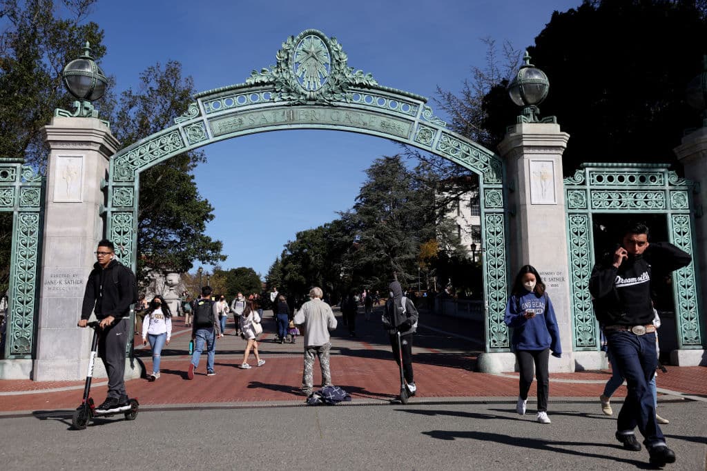 People walk through Sproul Plaza on the UC Berkeley campus, as seen in March 2022 in Berkeley, California. (Photo by Justin Sullivan/Getty Images)