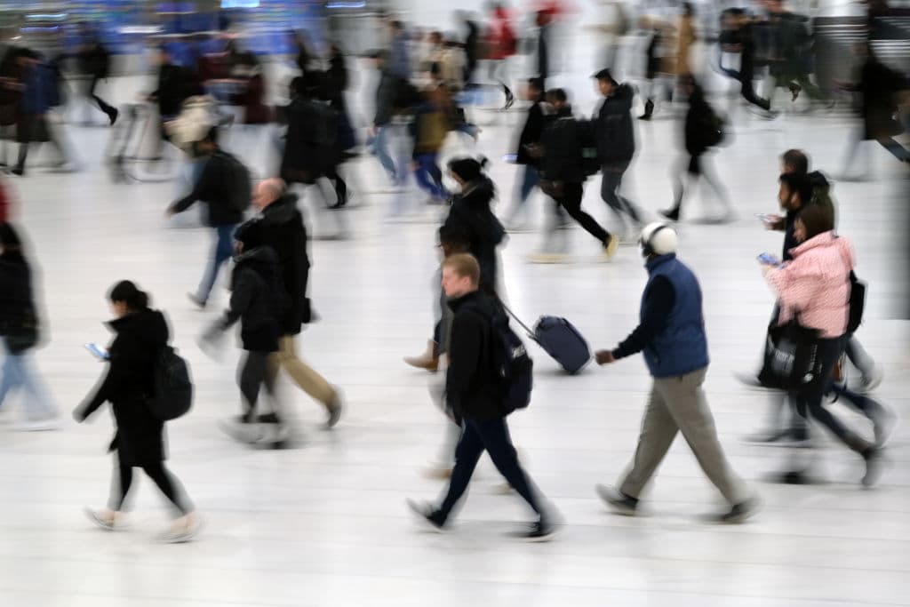 Commuters arrive into the Oculus station and mall in Manhattan, as seen in November 2022 in New York City. (Photo by Spencer Platt/Getty Images)