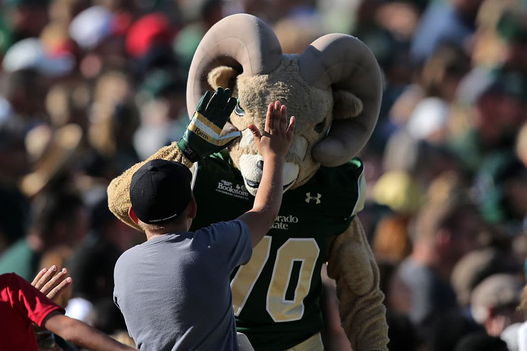 Cam the Ram celebrates with a fan as they support the Colorado State Rams against the Minnesota Golden Gophers at Sonny Lubick Field at Hughes Stadium, as seen in September 2015 in Fort Collins, Colorado. (Photo by Doug Pensinger/Getty Images)