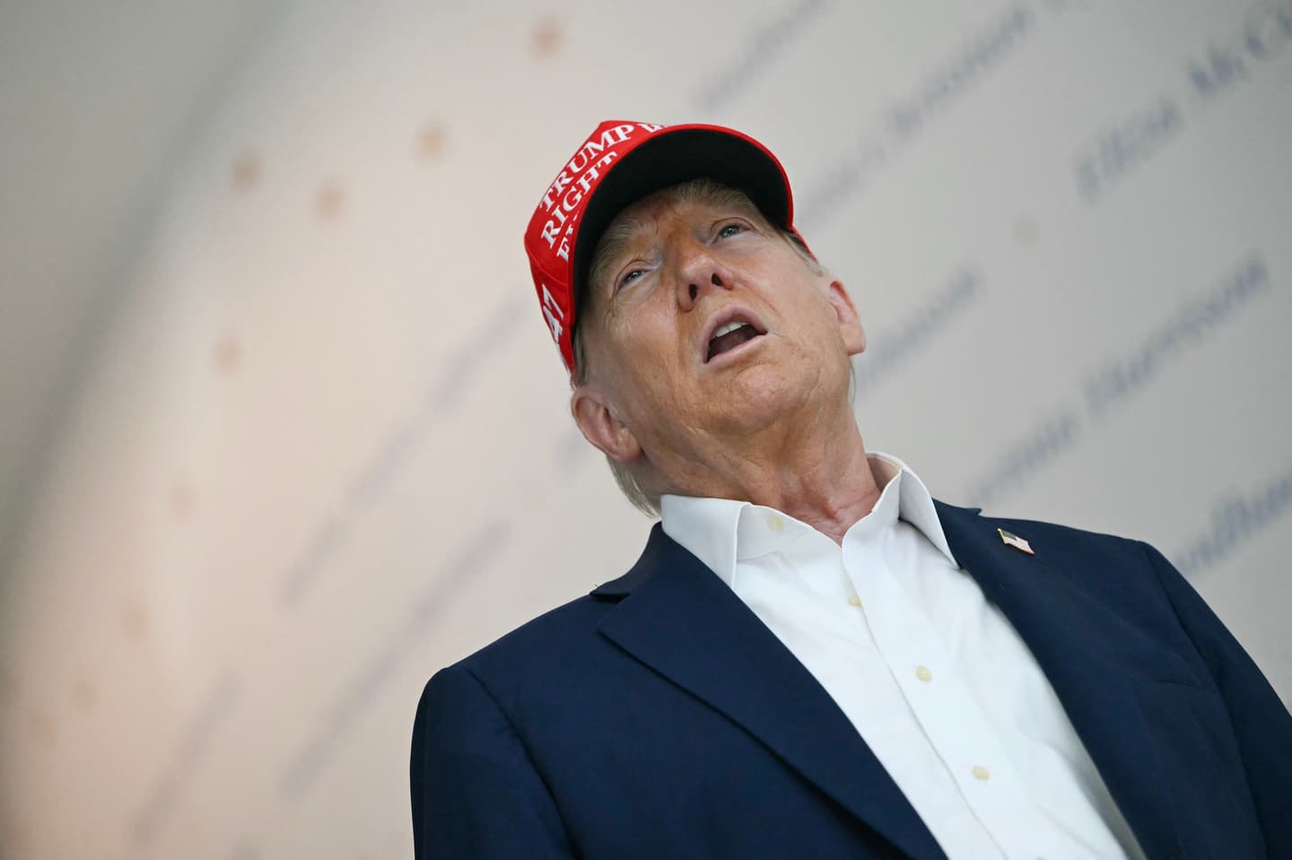 Photo: US President Donald Trump speaks at "The People's House," a White House immersive experience across the street from the Eisenhower Executive Office Building, during a tour on August 22, 2025, in Washington, DC. US President Donald Trump on Friday said he would fire Federal Reserve governor Lisa Cook if she did not resign, after he excoriated her over claims of mortgage fraud. (Photo by ANDREW CABALLERO-REYNOLDS / AFP) (Photo by ANDREW CABALLERO-REYNOLDS/AFP via Getty Images)