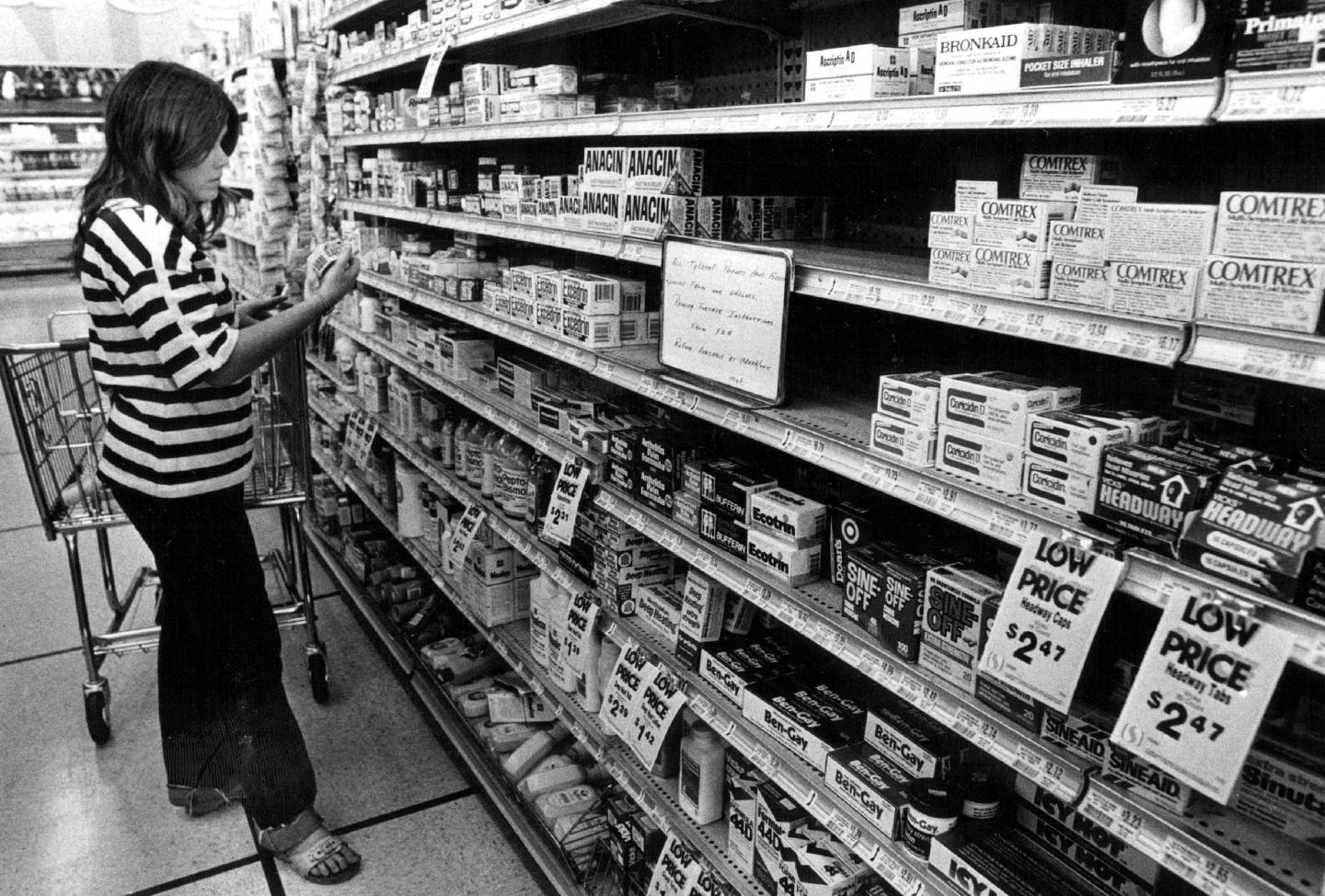A Capitol Hill Resident looks for a medicine other than the Extra-Strength Tylenol she used to use before the product was removed from store shelves.