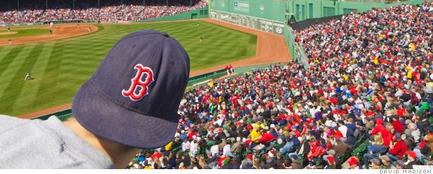 A Red Sox fan watches game from right field.
