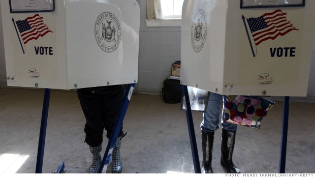 Residents of Breezy Point Queens vote in the 2012 presidential election at St. Genevieve Parish Hall in New York on November 6, 2012. The neighborhood was devastated by Hurricane Sandy and a fire that destroyed and damaged more than 100 homes. AFP PHOTO/Mehdi Taamallah (Photo credit should read MEHDI TAAMALLAH/AFP/Getty Images)