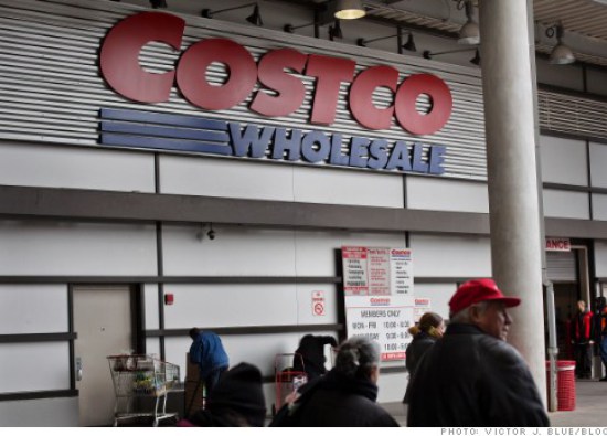 Shoppers buy goods at a Costco store in New York, NY, Monday, March 11, 2013.