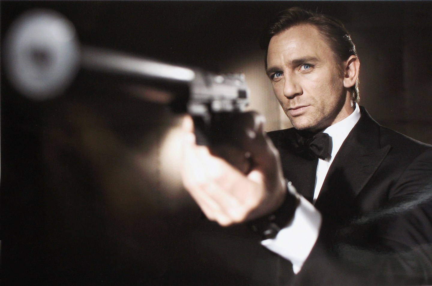 Actor Daniel Craig poses as James Bond.