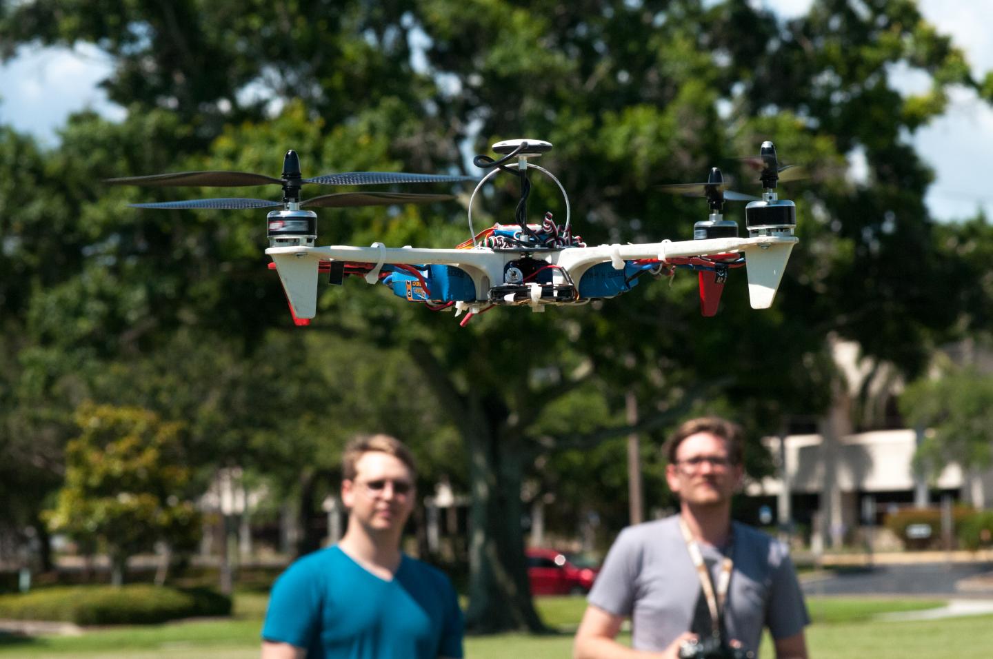 Greg LeCompte (left) and Kevin Lupex fly their drone in St. Petersburg, Fla.