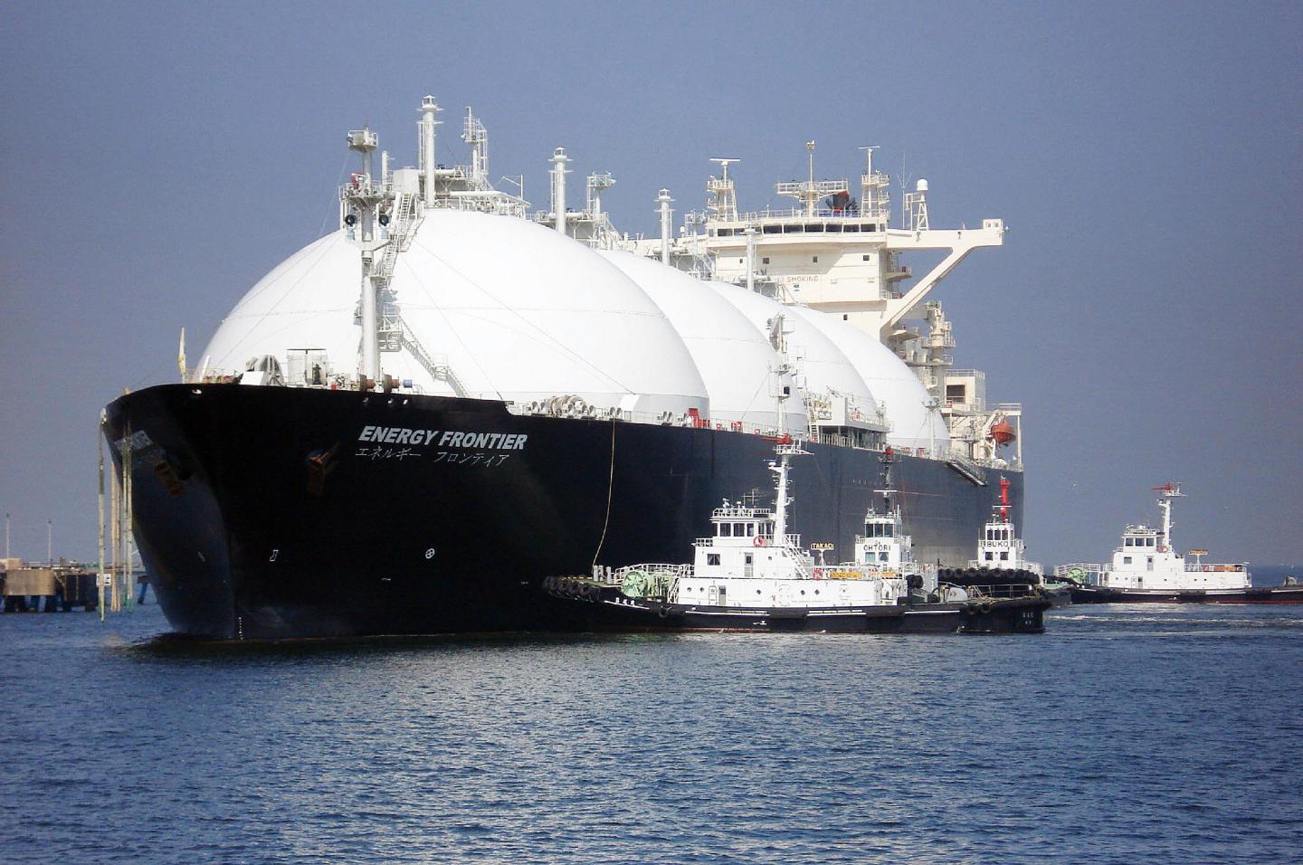 A liquefied natural gas (LNG) tanker arr