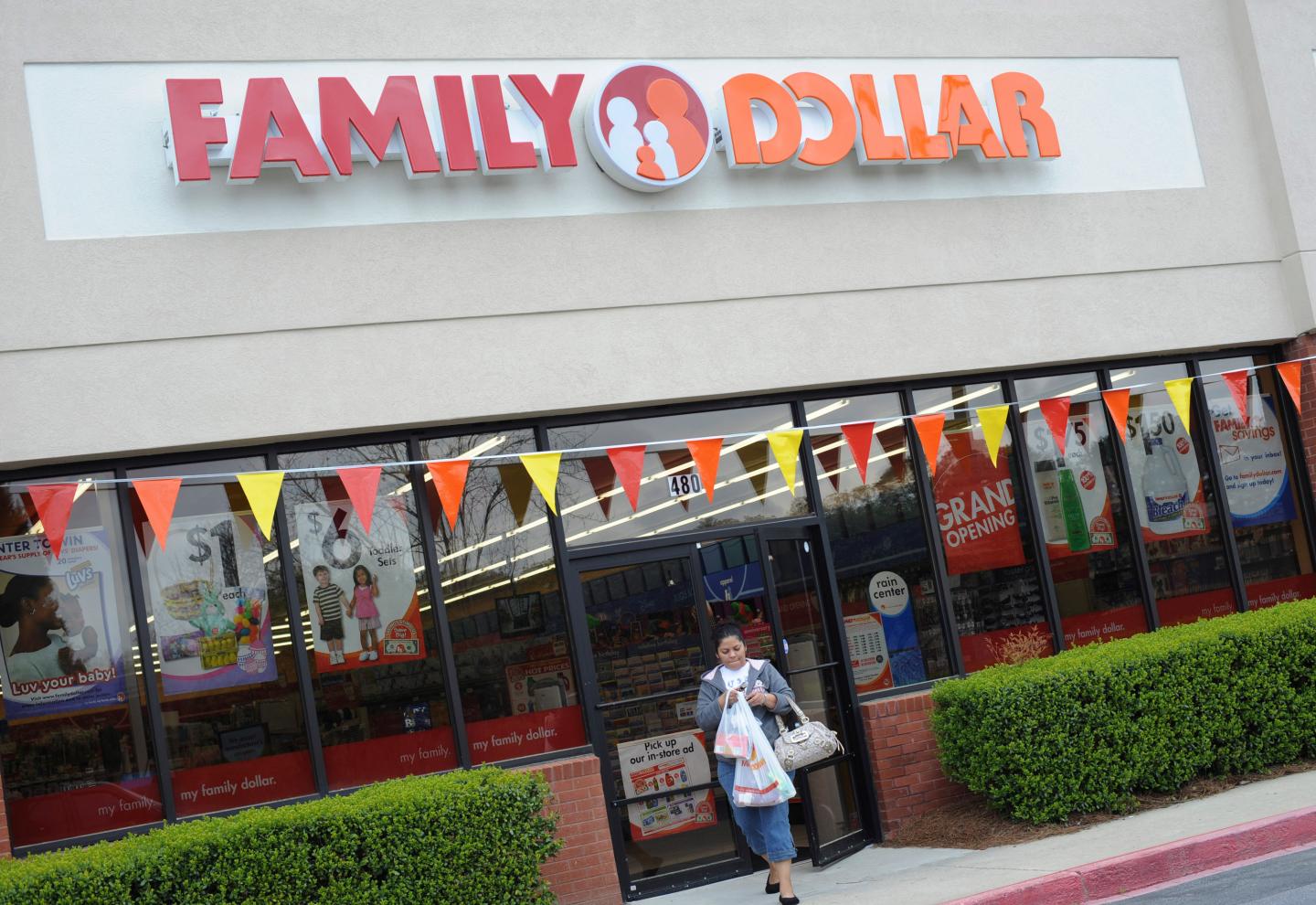 Ana Meija walks out of at a Family Dollar store in Norcross,