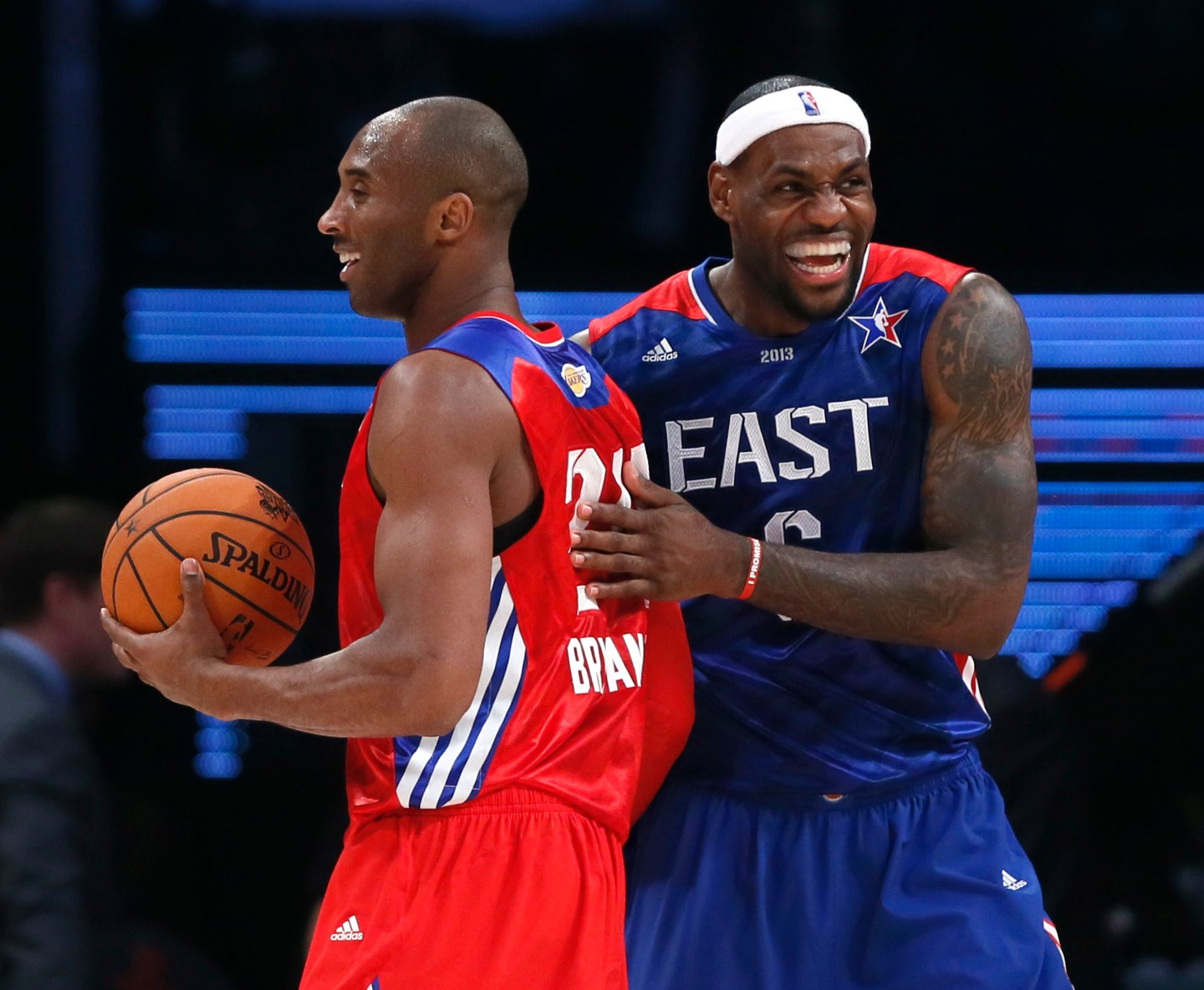 NBA All-Star Bryant of the Lakers and All-Star James of the Heat share a laugh during the NBA All-Star basketball game in Houston