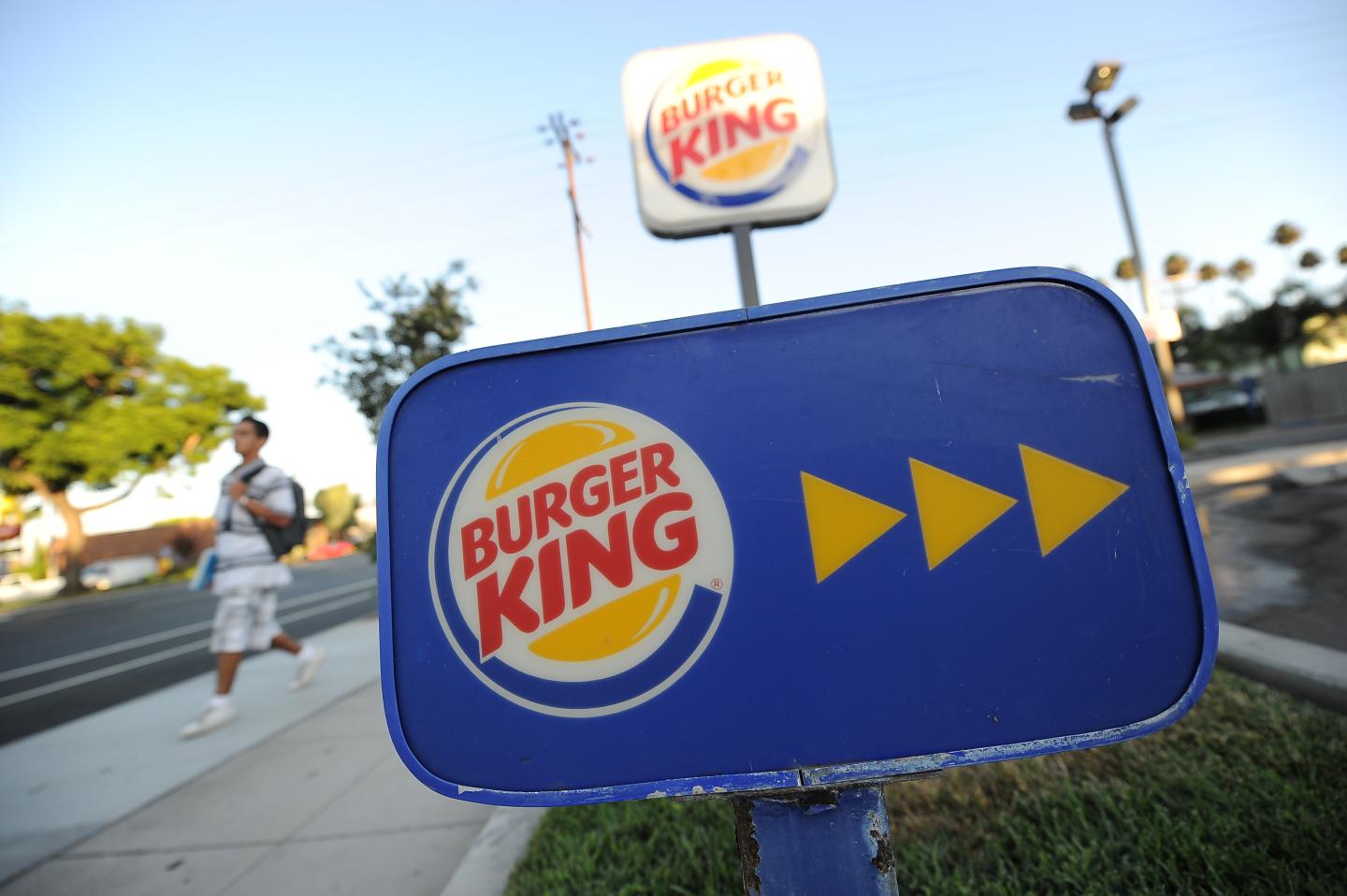A Burger King sign outside a restaurant