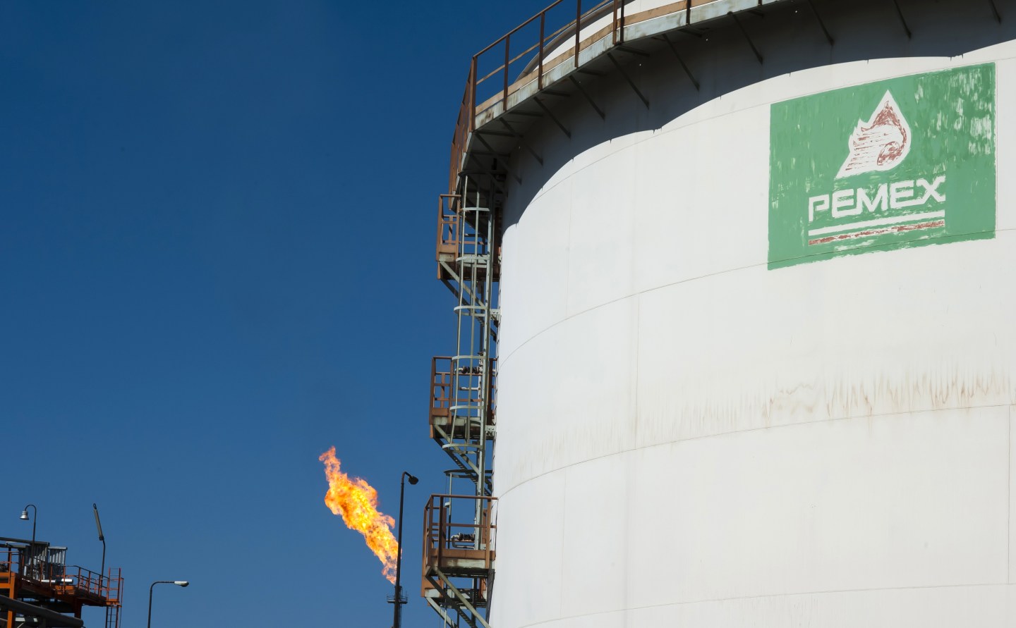 View of a tank with processed oil in fro