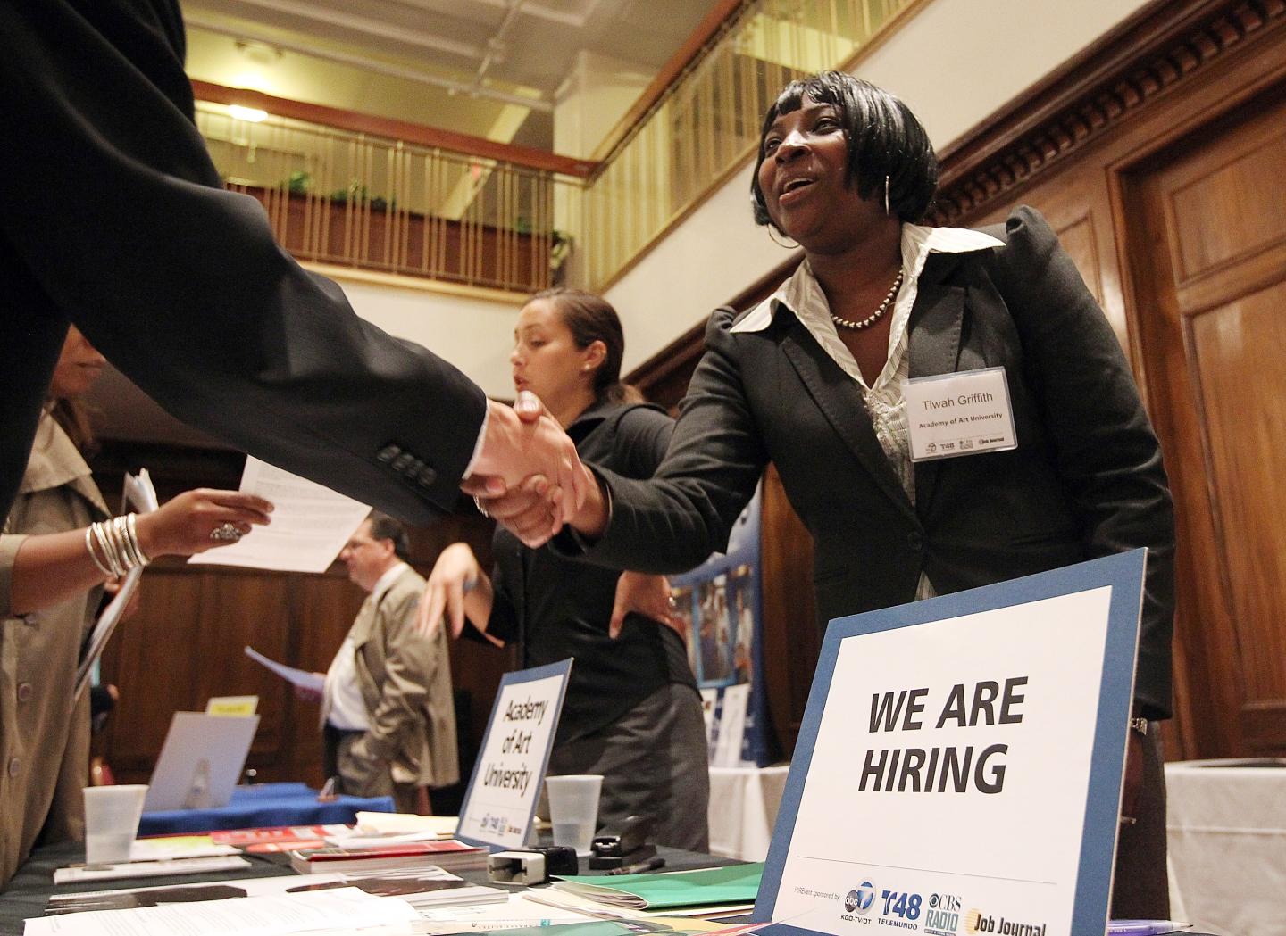 Job Seekers  Meet With Recruiters At Job Fair