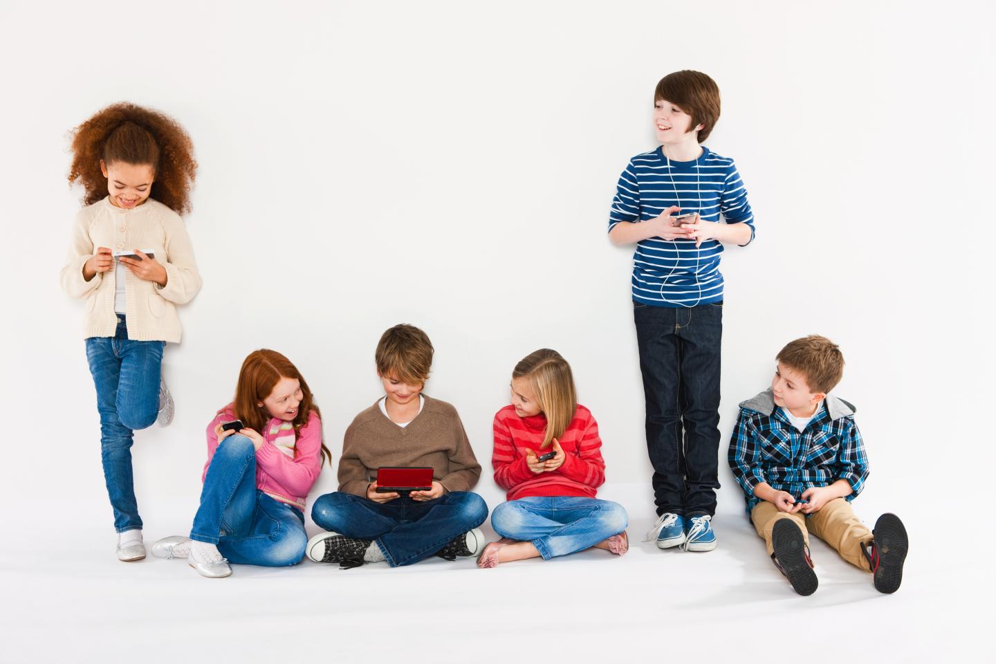 Children using different gadgets