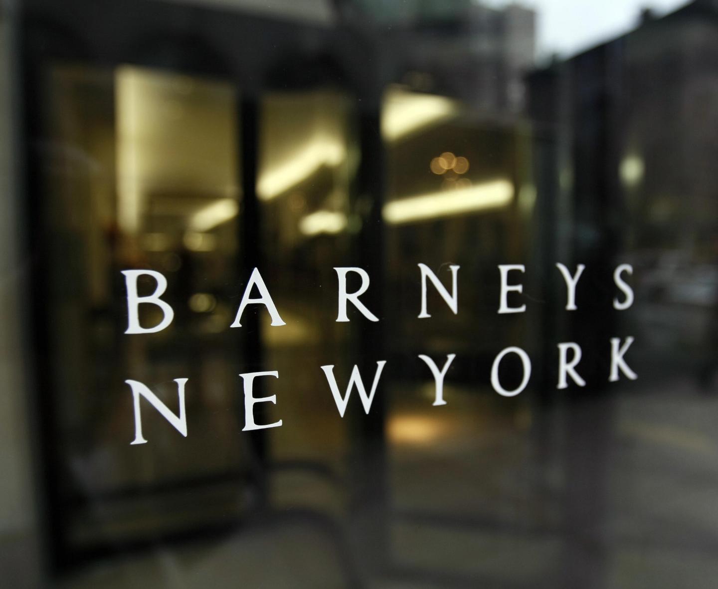 (FILES) The front window of Barneys New