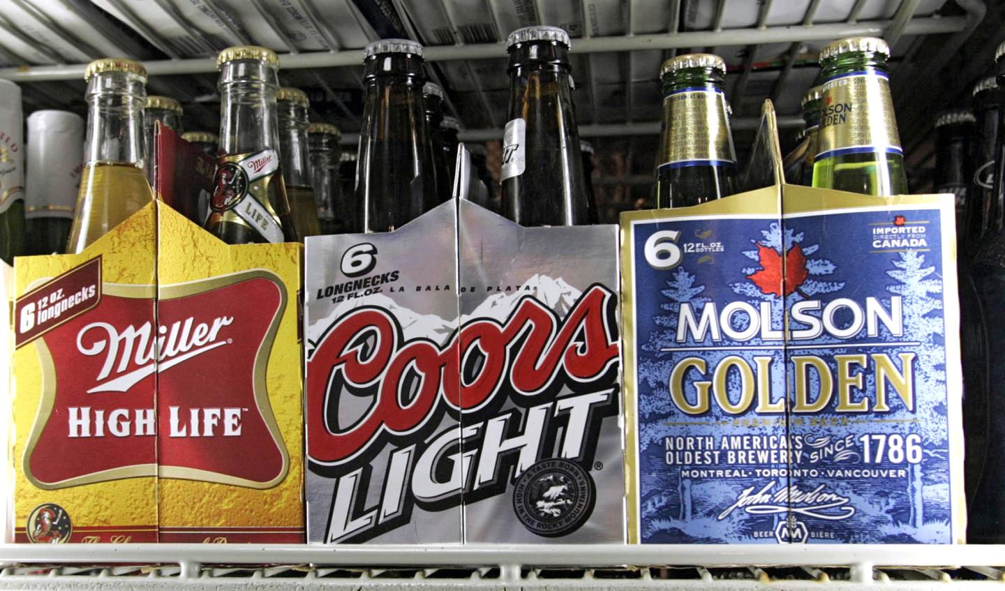 Six packs of Miller High Life, Coors Light and Molson Golden