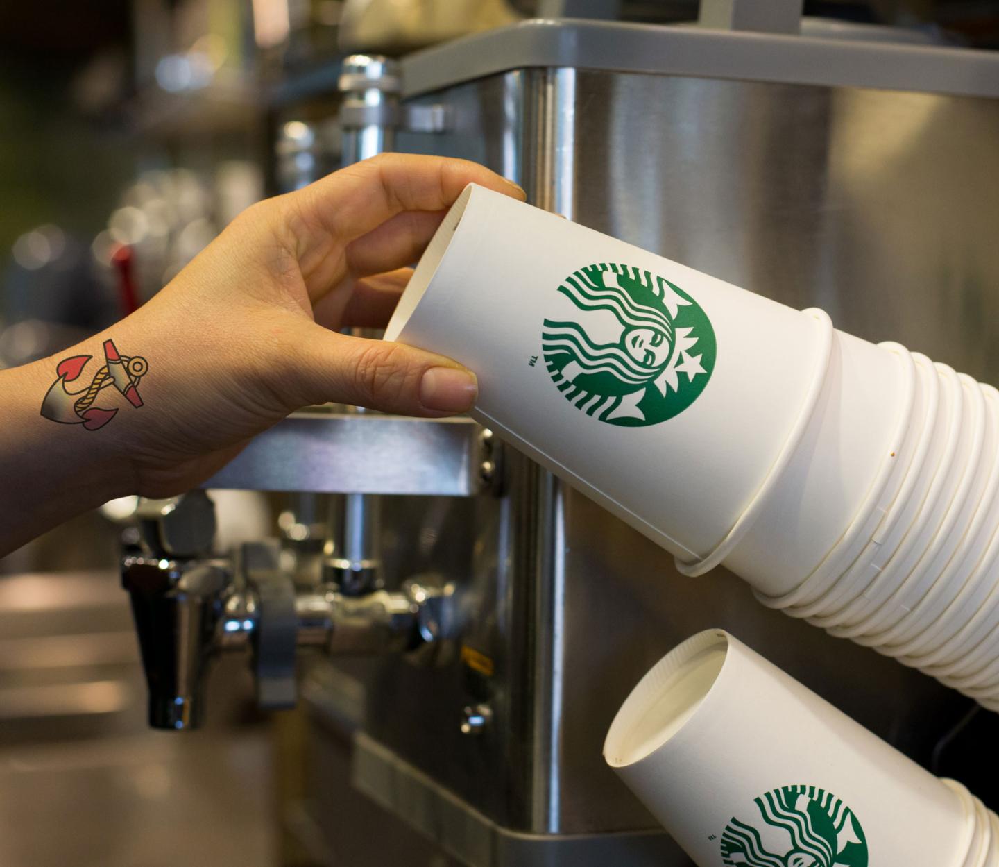 Corporate dress codes relax in an age of tattoos, piercings