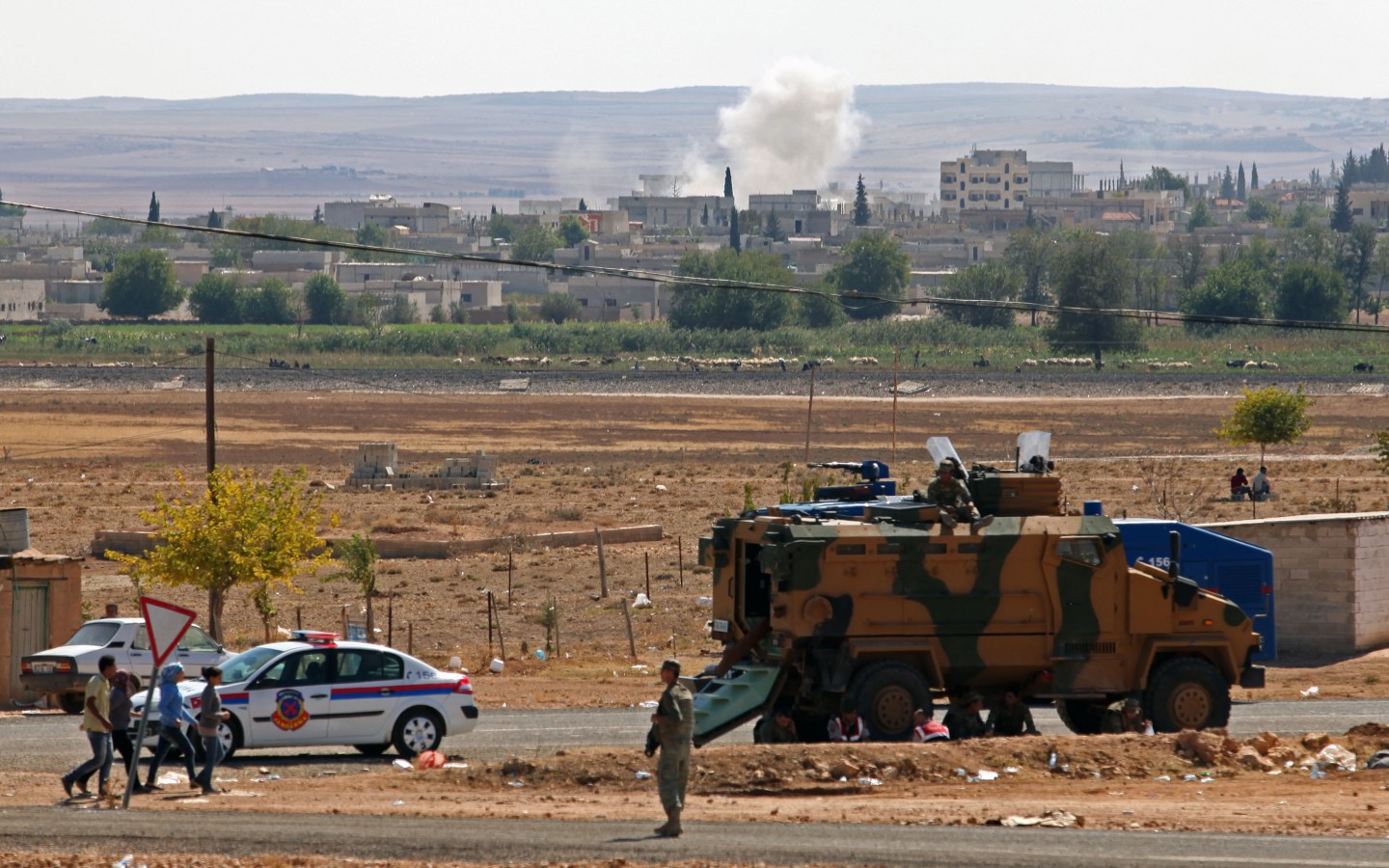 Syrian Kurds Fleeing The Islamic State Militants Cross Into Turkey