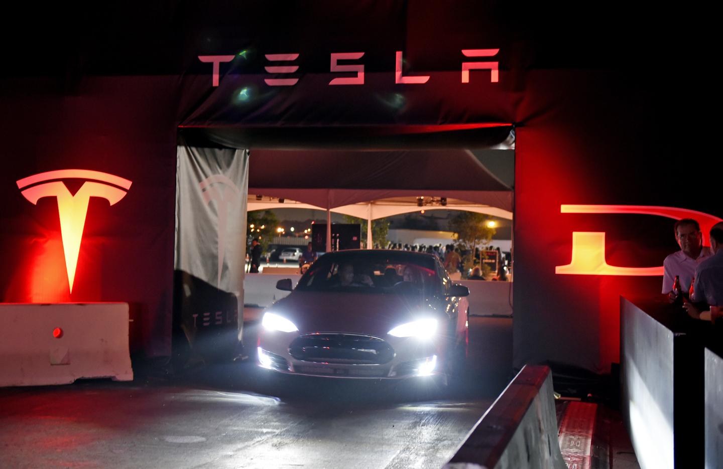 Telsa CEO Elon Musk Unveils New Vehicle