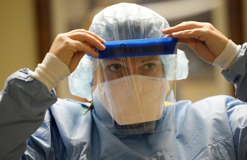 The medical staff at Presbyterian/St. Luke's Medical Center are practicing safe procedures for "donning and doffing" of the medical protection gear in the event they begin treating ebola patients at the Denver hospital