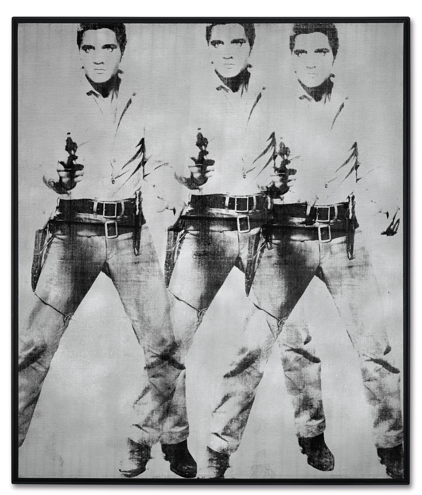 Warhol’s paintings of Elvis, Brando help Christie’s set a new auction record