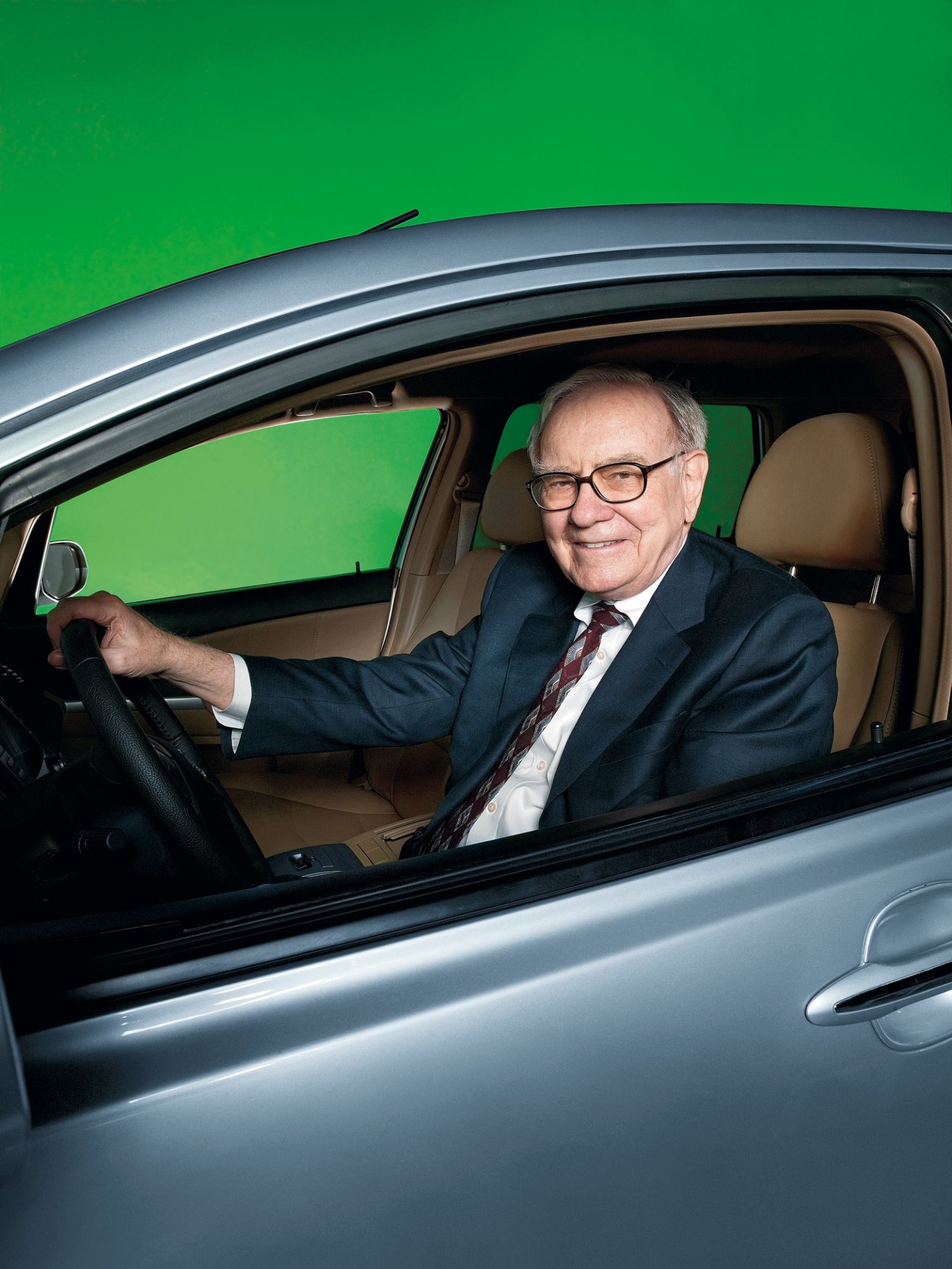 Warren Buffet sitting in a BYD car in Omaha Nebraka.