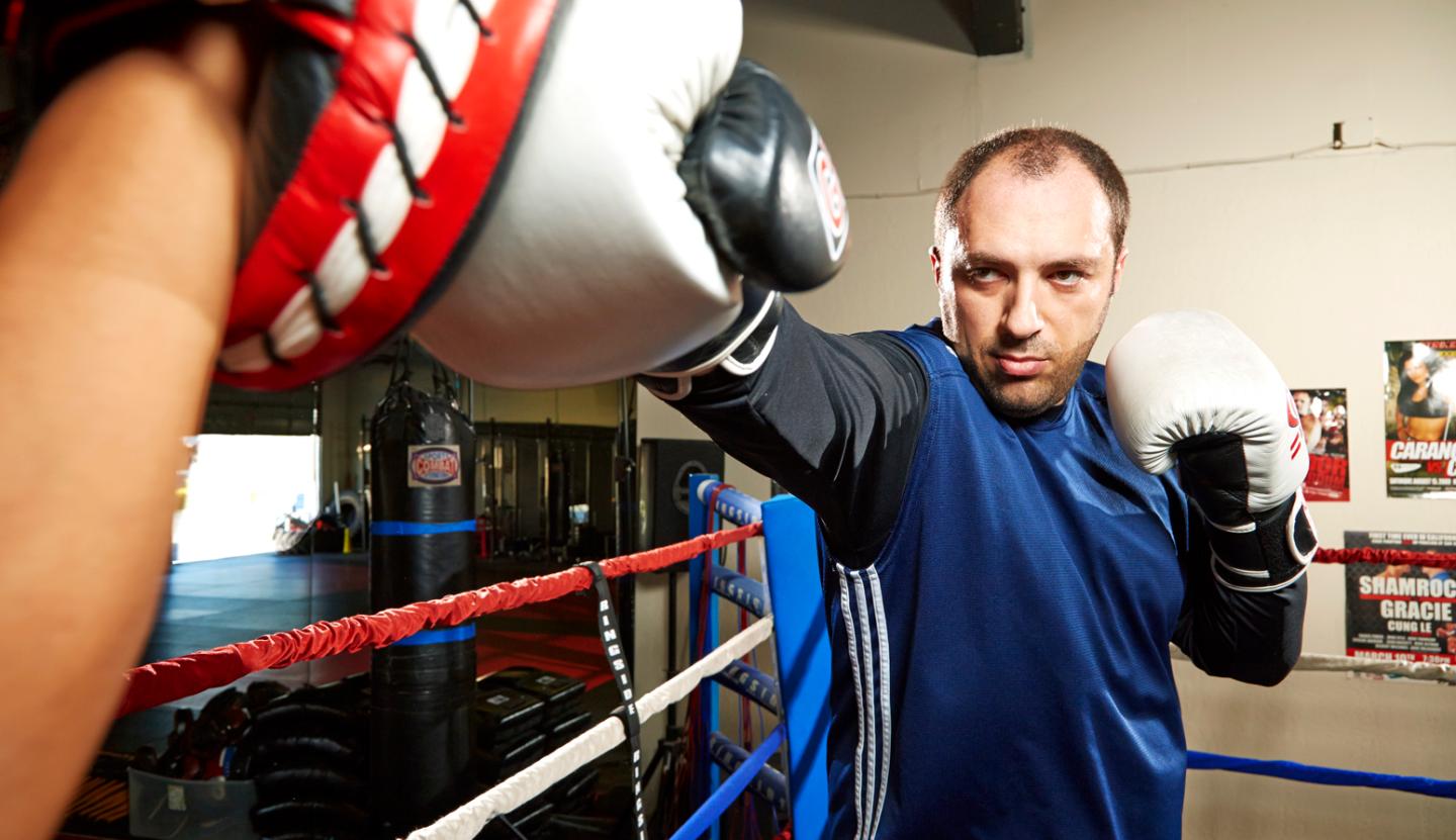 Jan Koum, founder of WhatsApp, practicing with his trainer Ed Carpio. Photographed at CCK Gym in San Jose on September 4, 2014 for Fortune Magazine 40under40 issue