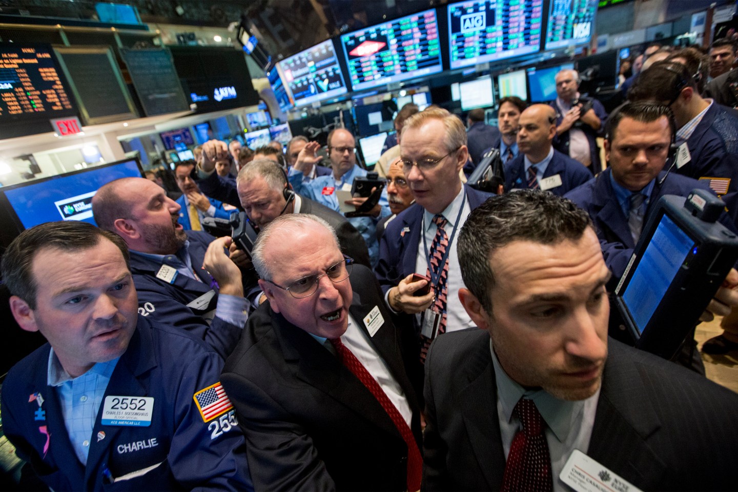 Traders work during the IPO of Parsley Energy Inc on the floor of the NYSE