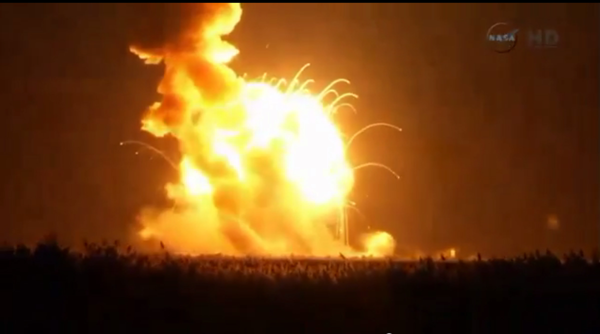 An unmanned Antares rocket is seen exploding seconds after lift off from a commercial launch pad in this still image from NASA video at Wallops Island, Virginia October 28, 2014. The 14-story rocket, built and launched by Orbital Sciences Corp, bolted off its seaside launch pad at the Wallops Flight Facility at 6:22 p.m. EDT/2222 GMT. It exploded seconds later. The cause of the accident was not immediately available. REUTERS/NASA TV/Handout via Reuters (UNITED STATES - Tags: SCIENCE TECHNOLOGY DISASTER TPX IMAGES OF THE DAY) FOR EDITORIAL USE ONLY. NOT FOR SALE FOR MARKETING OR ADVERTISING CAMPAIGNS. THIS IMAGE HAS BEEN SUPPLIED BY A THIRD PARTY. IT IS DISTRIBUTED, EXACTLY AS RECEIVED BY REUTERS, AS A SERVICE TO CLIENTS - RTR4BYKF