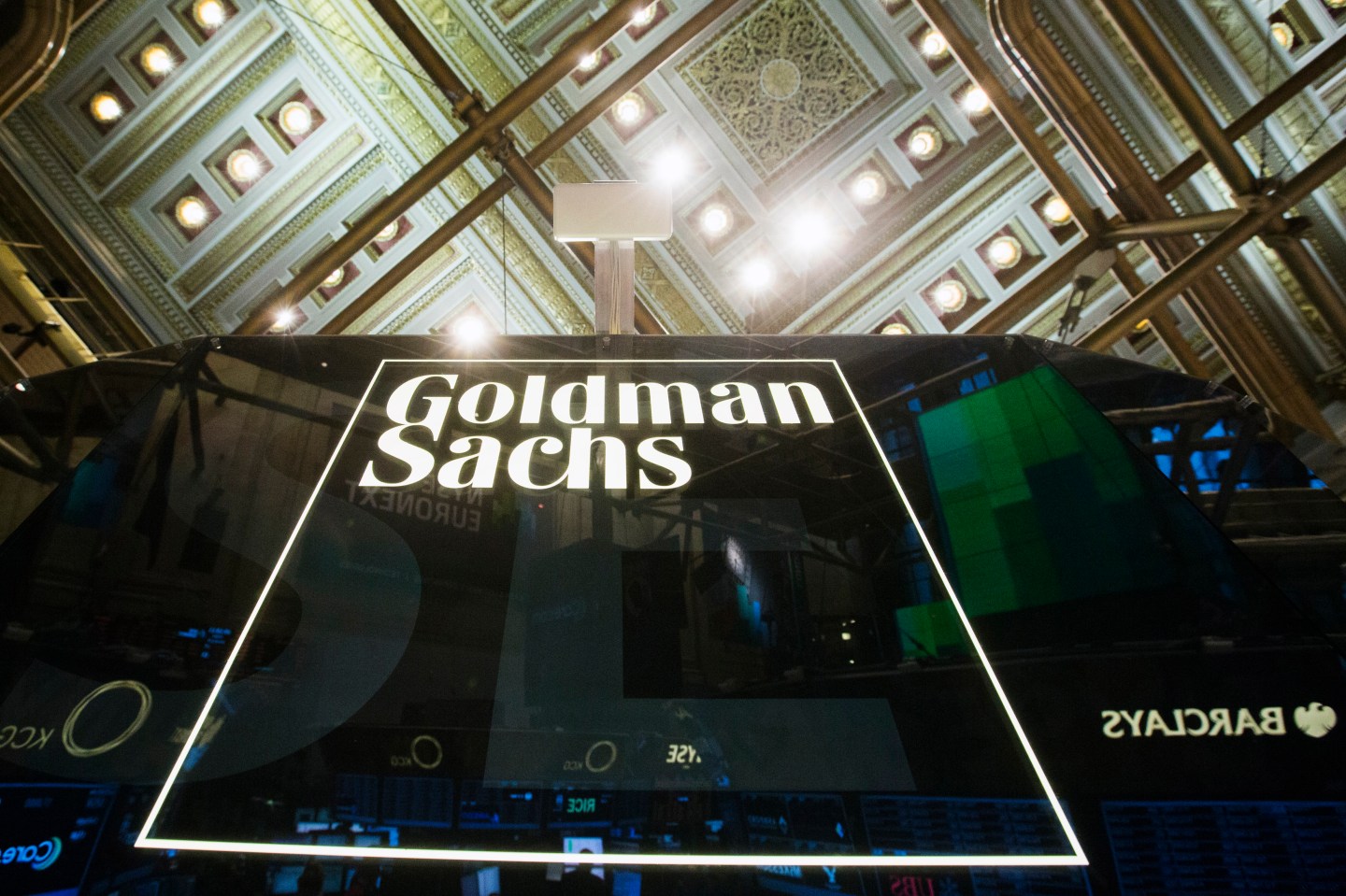 A Goldman Sachs sign is seen above the floor of the New York Stock Exchange shortly after the opening bell in the Manhattan borough of New York January 24, 2014.  REUTERS/Lucas Jackson (UNITED STATES - Tags: BUSINESS) - RTX17T1D