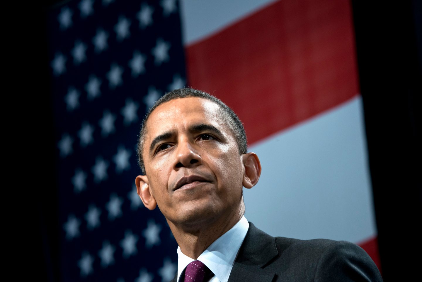 US President Barack Obama pauses while s