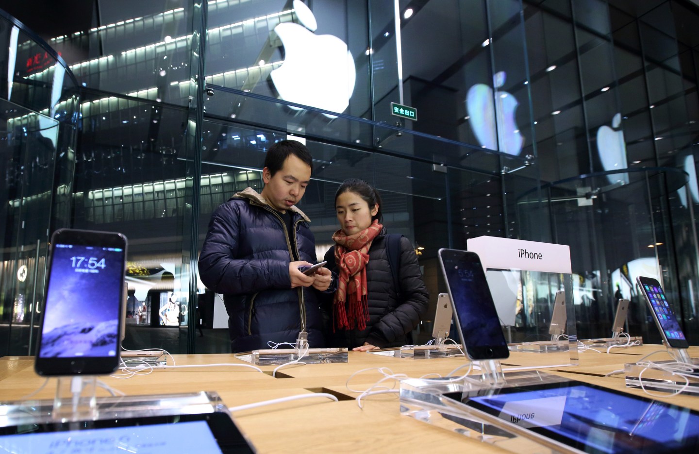 Shoppers And Product Displays Inside The Apple Inc. Store At China Central Mall