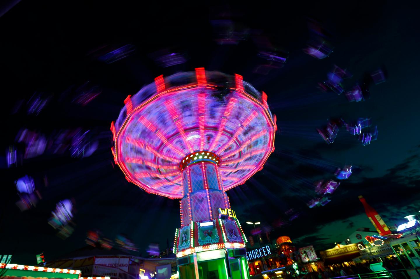 Visitors ride a merry-go-round during the opening day of the Oktoberfest in Munich