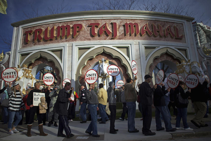 Union members from UNITE HERE Local 54 rally outside the Trump Taj Mahal Casino in Atlantic City, New Jersey