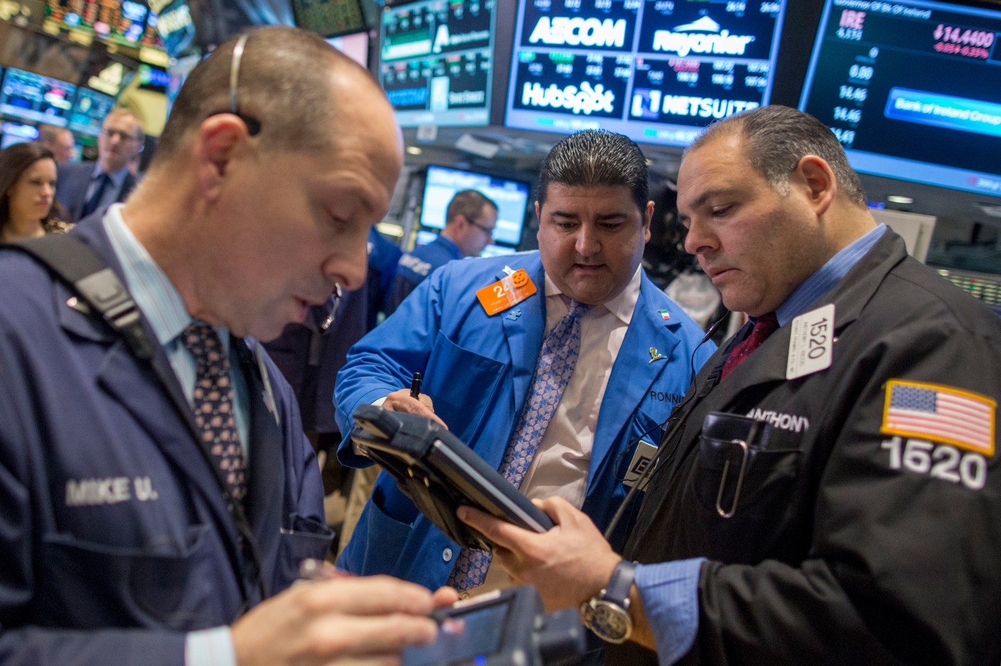 Traders work on the floor of the New York Stock Exchange