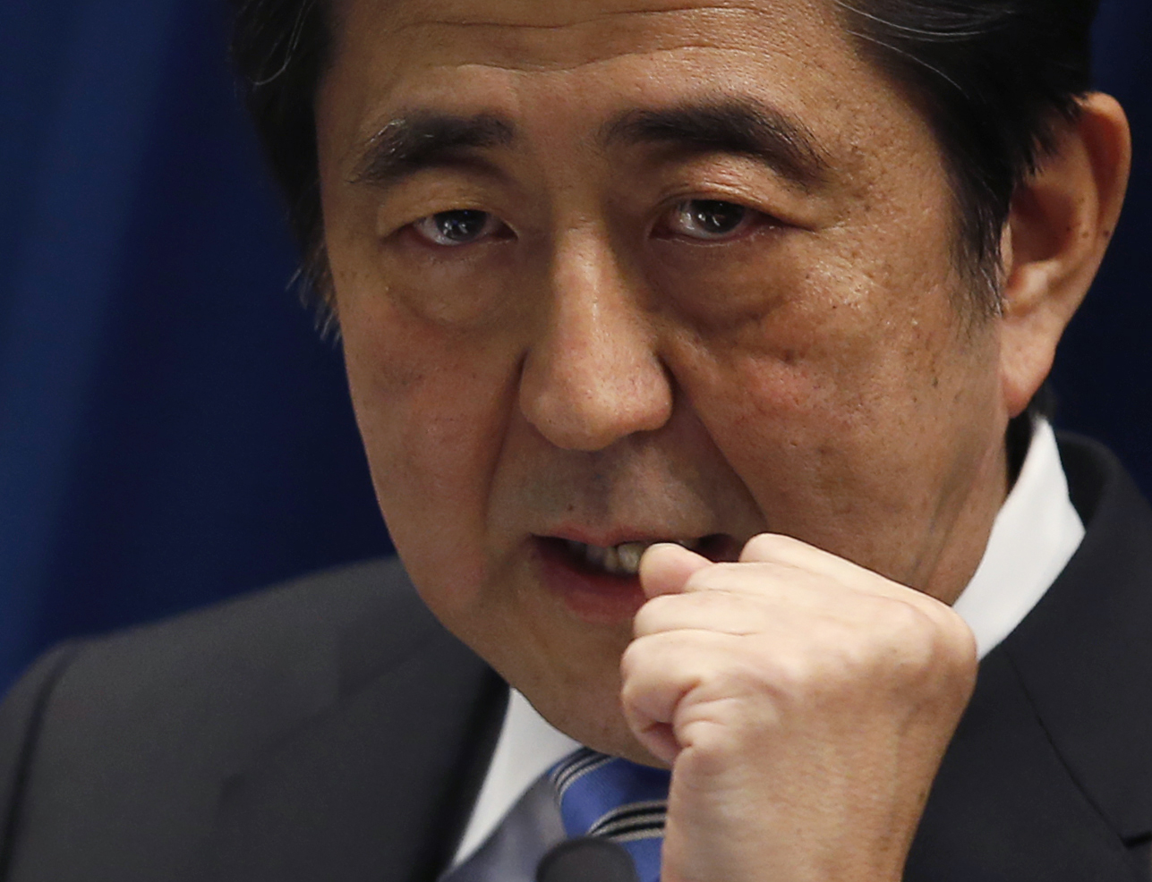 Japan's PM Abe speaks during a news conference at his official residence in Tokyo