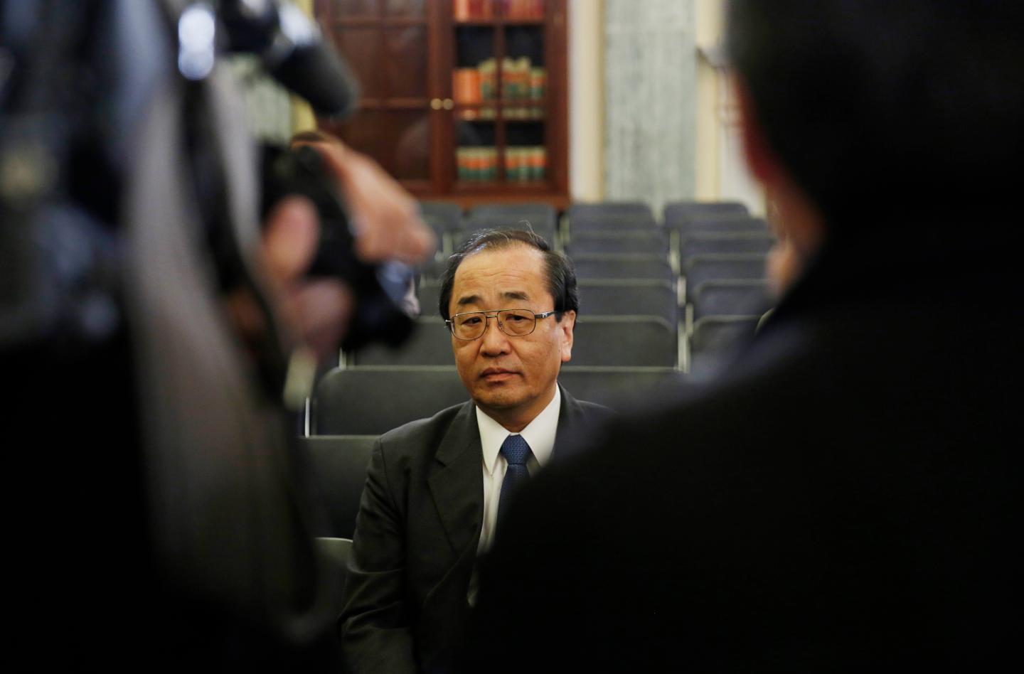 Takata airbag official Shimizu waits to testify on defective airbags at Senate Commerce Science and Transportation Committee hearing  in Washington