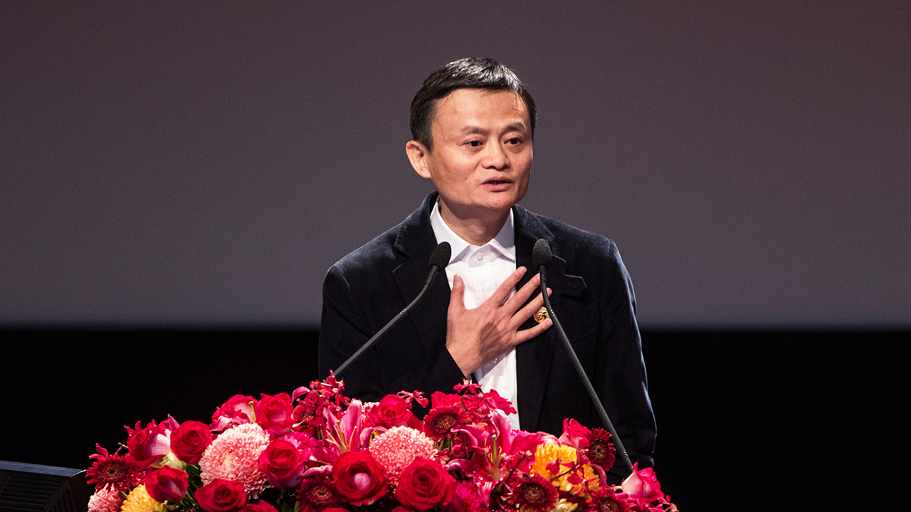 Caption:Billionaire Jack Ma, chairman of Alibaba Group Holding Ltd., gestures as he speaks at the Cross-Strait Chief Executive Summit in Taipei, Taiwan, on Monday, Dec. 15, 2014. Ma, the 50-year-old founder of China's biggest e-commerce company Alibaba, passed Li Ka-shing, the Hong Kong property and ports tycoon, to become the richest person in Asia, according to the Bloomberg Billionaires Index. Photographer: Ashley Pon/Bloomberg via Getty Images
