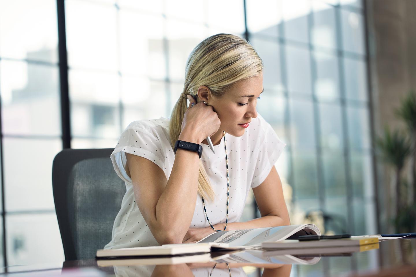 Microsoft Band woman office