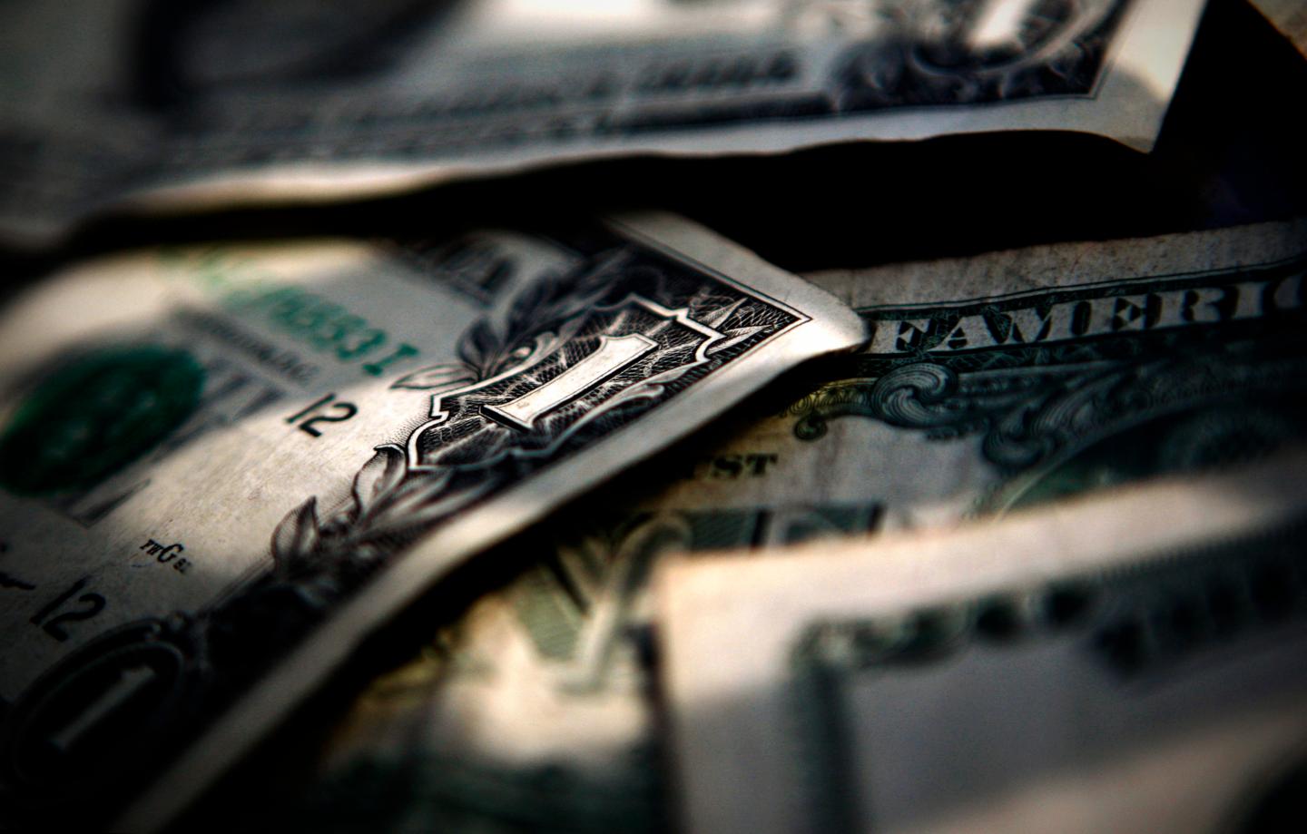 U.S. dollar bills are displayed in Toronto in this posed photo