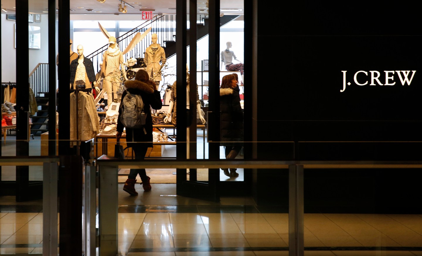 A customer walks into a clothing retailer J.Crew store in Manhattan, New York