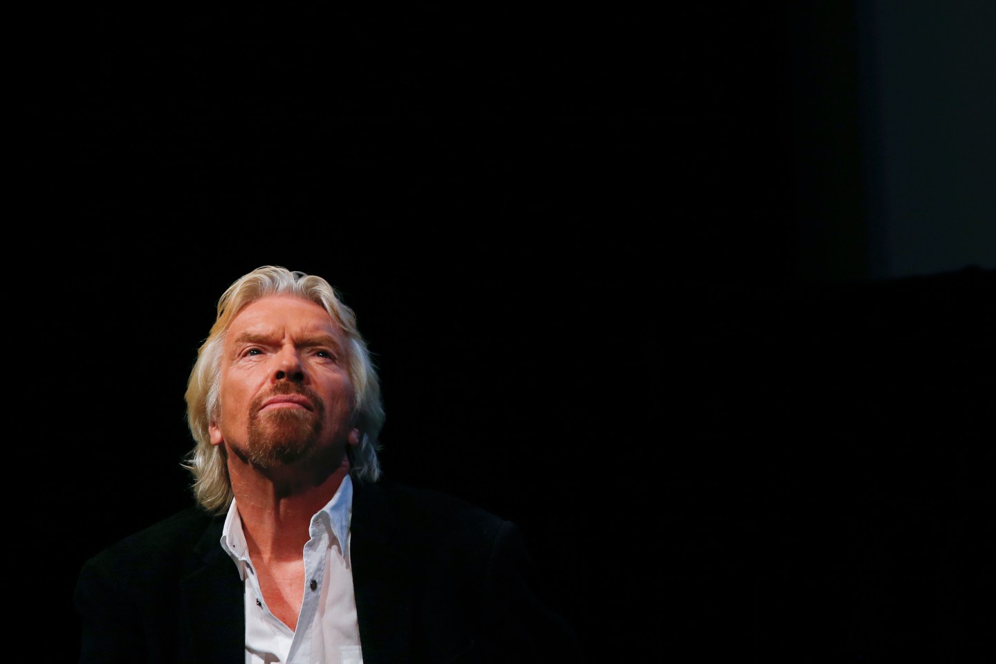 Sir Richard Branson listens to a speaker at the Global Commission on Drug Policy in New York
