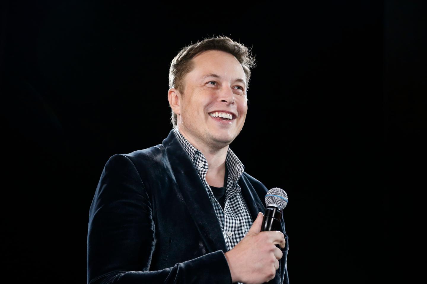 Tesla Motors Inc CEO Elon Musk unveils a new all-wheel-drive version of the Model S car in Hawthorne, California