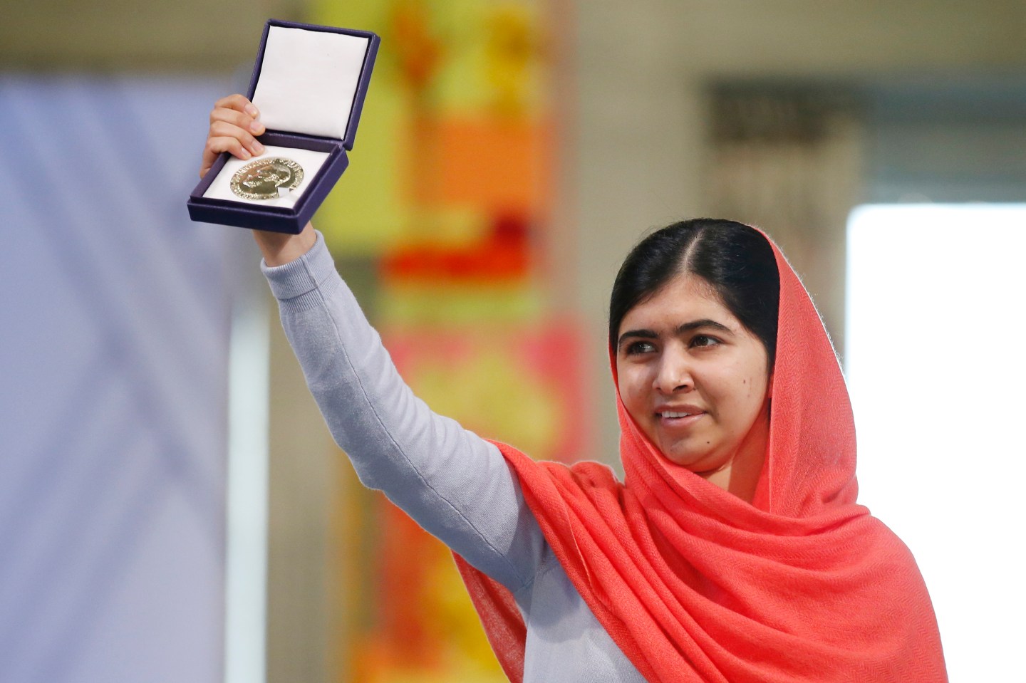 Nobel Peace Prize laureate Malala Yousafzai poses with her medal during the Nobel Peace Prize awards ceremony at the City Hall in Oslo December 10, 2014.